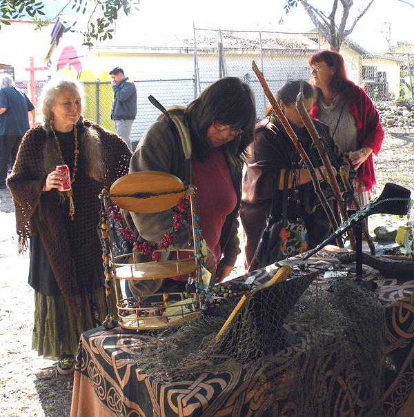 Ladies admiring Pirate Primitive items